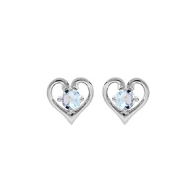Boucles d'oreille en argent rhodié coeur avec Topaze bleu clair véritable serti et fermoir poussette