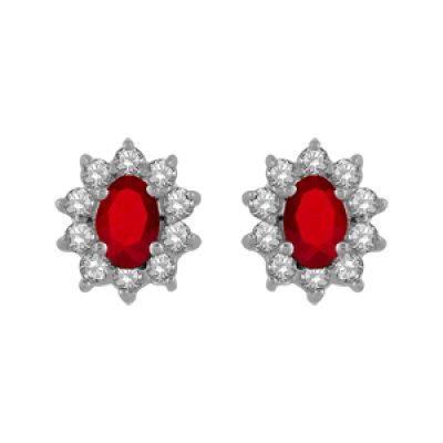 Boucles d'oreilles en argent rhodié collection joaillerie oxyde rouge au centre et petits oxydes blancs autour et fermoir poussette
