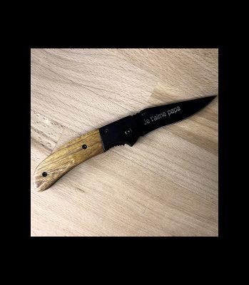Canif avec cran d'arrêt manche en bois et lame noire gravée