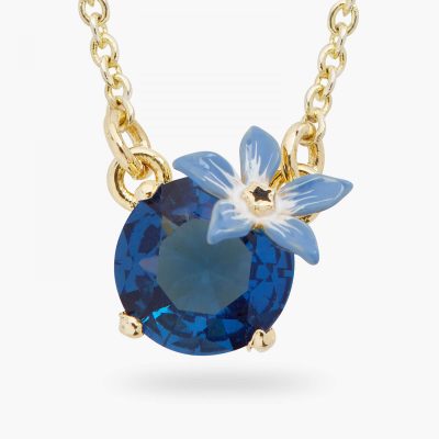 Collier pendentif fleur bleue et verre facetté rond