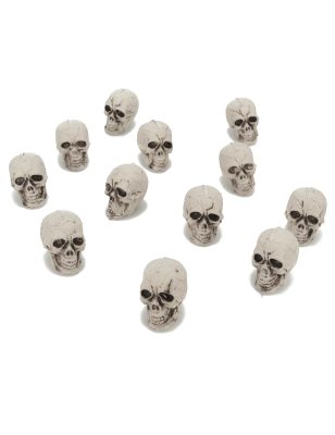 12 Petites têtes de mort plastique